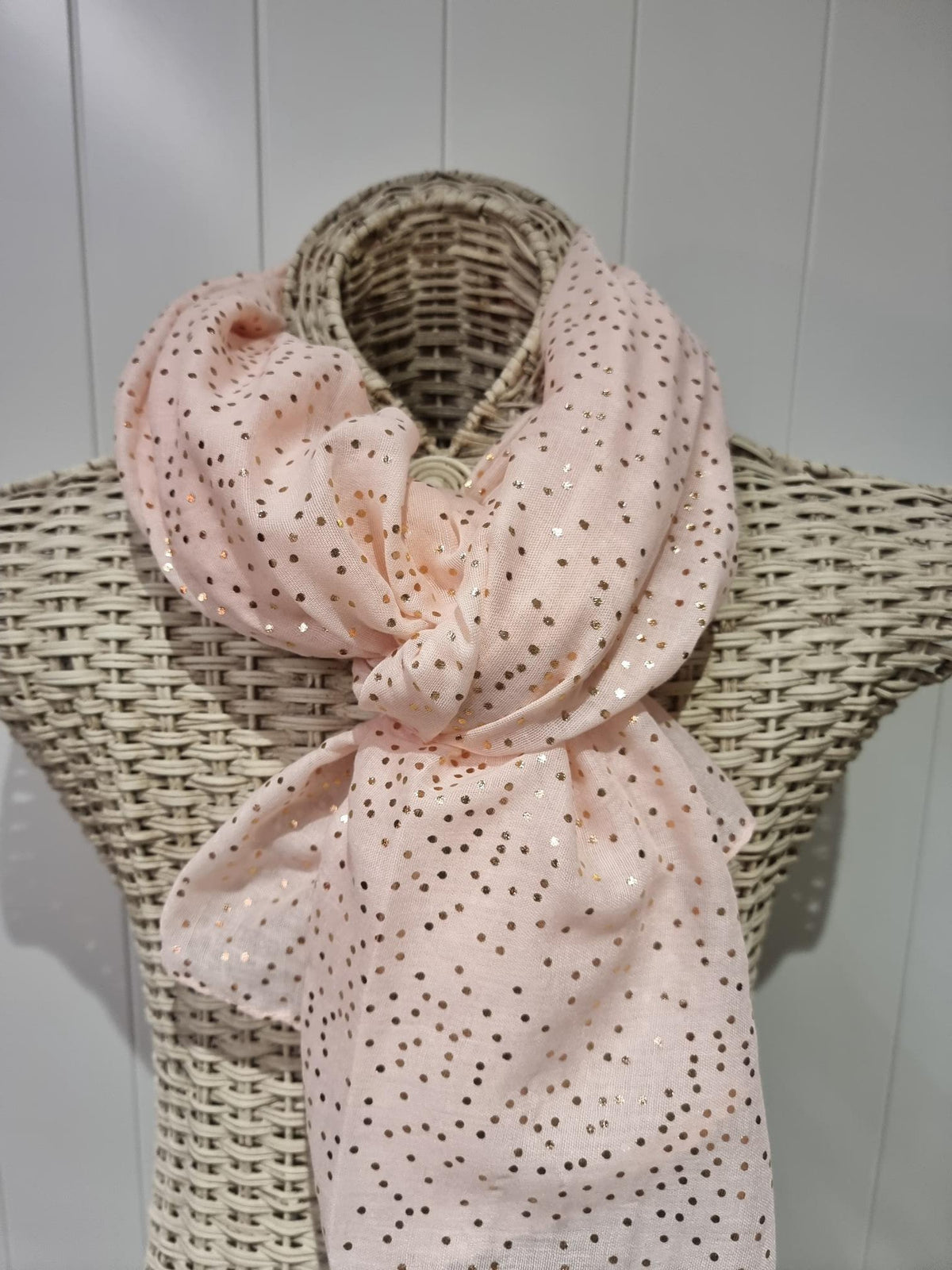 Viscose scarf in pink or mint with scattered rose gold spots, draped softly to show the fabric