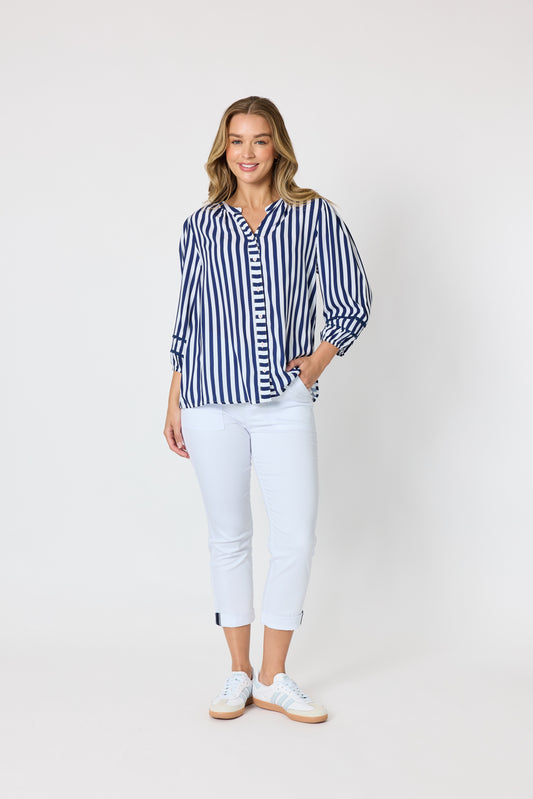 Navy and white vertical stripe viscose top with mandarin collar and three-quarter sleeves trimmed with double ric rac