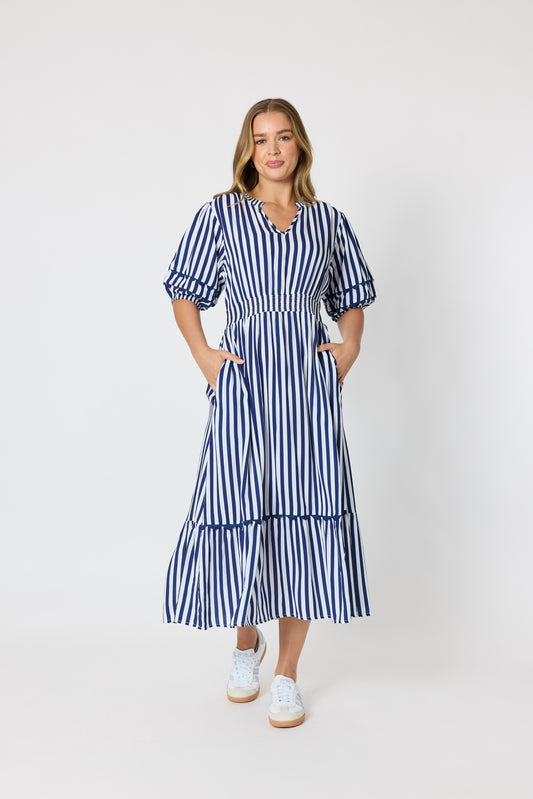 Navy and white vertical striped viscose dress with a V-neckline, ric rac trim and pockets