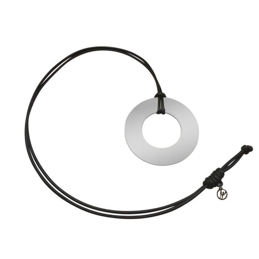 Long necklace with a large silver circle pendant hanging from a black leather cord with a sliding knot