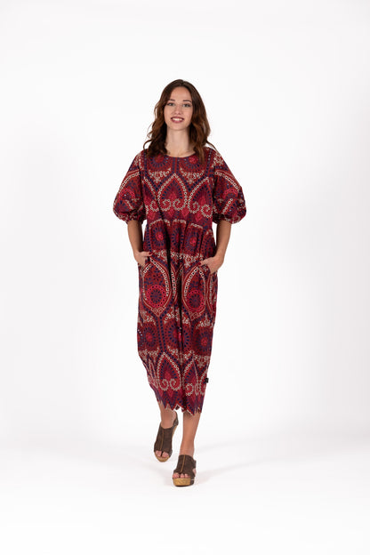 Gypsy Rose print dress in berry and spice tones with balloon sleeves, a relaxed floaty skirt and pockets