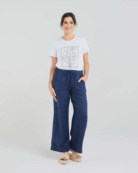 French navy wide leg linen pants with a drawstring tie waist and a side split at the bottom of each leg