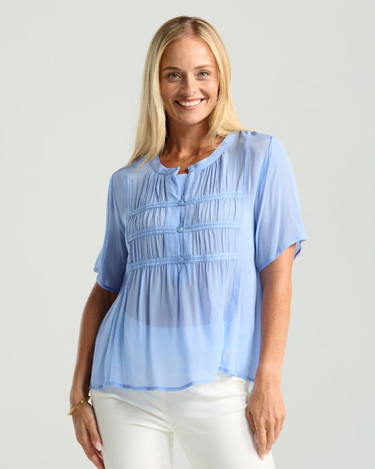 Hilarie gathered front top in viscose with buttons down the front, shirring detail and short sleeves, shown in Emerald green
