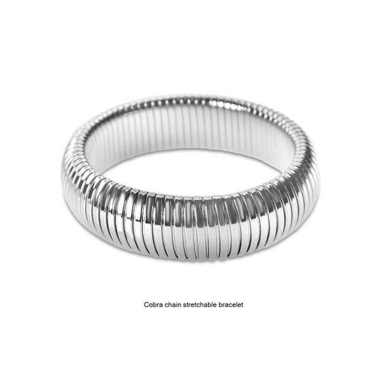 Slim cobra chain bracelet in silver and gold brass with an adjustable fastening