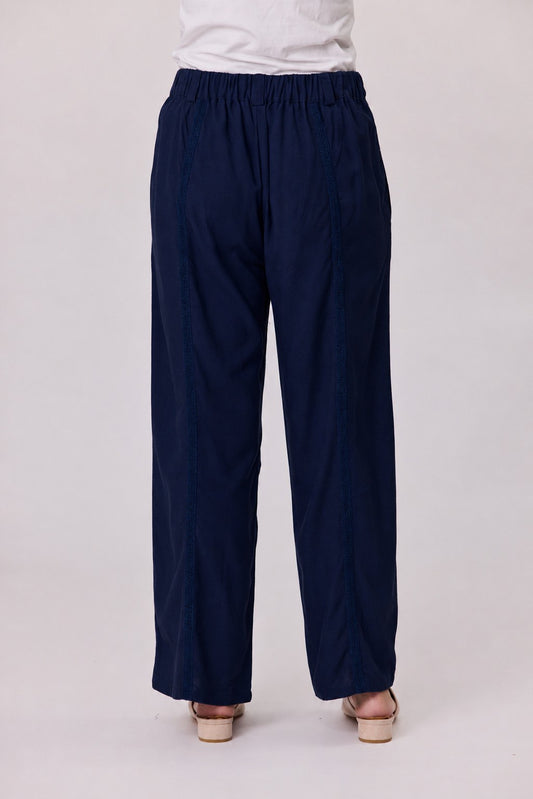 Navy linen-blend pull-on pants with ladder lace trim down the leg, flat front and side pockets