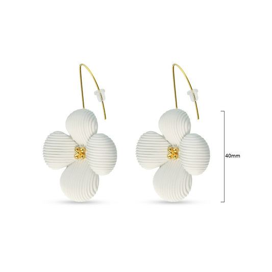Pair of white enamel flower earrings with gold metal edges and fish hook fittings
