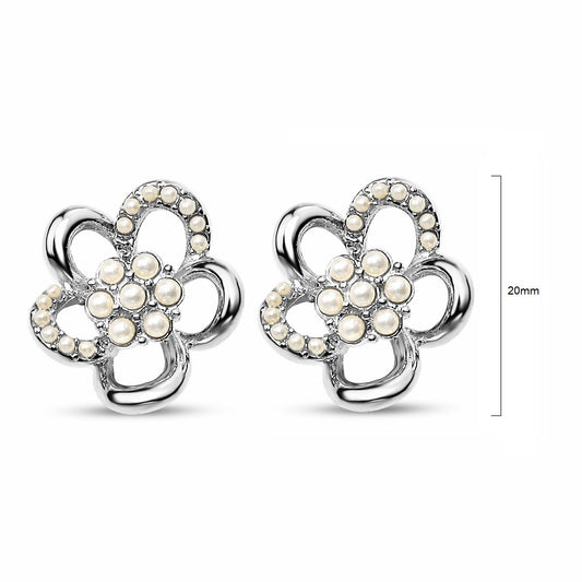 Pair of delicate gold metal flower earrings with small seed pearls and a polished rhodium finish