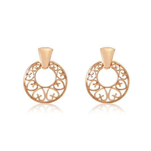 Pair of rose gold earrings with an intricate metal filigree door knocker design and openwork piercing details