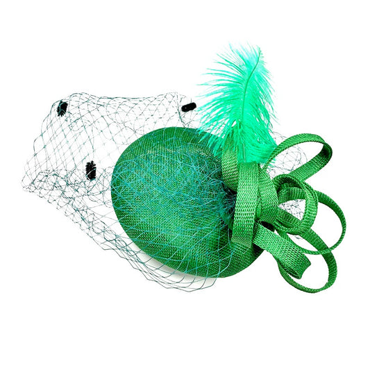 Classic fascinator in green, with a headband and hair clip, shown alongside a black version