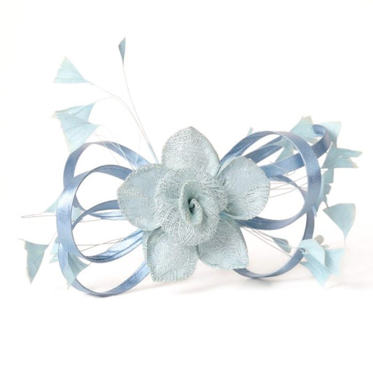 Hand-cut blue feather brooch by Autun with intricate cut feather designs and delicate patterns