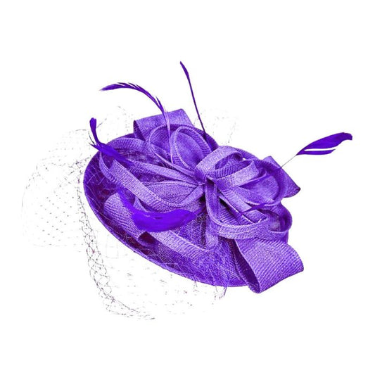 Purple fascinator with delicate feathers and floral accents, shown from the front