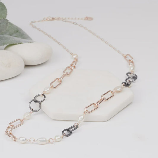 Long mixed link chain necklace in matte rose gold and hematite tones with pearl details, shown with a 90cm chain