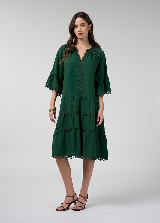 Jungle green tiered dress with gathered sleeve hems, a V-neckline at the centre front and an inserted trim