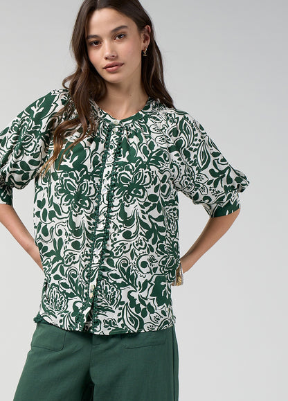 Buttermilk multi silk blend button-up top with shirred shoulders and an inserted trim along the placket