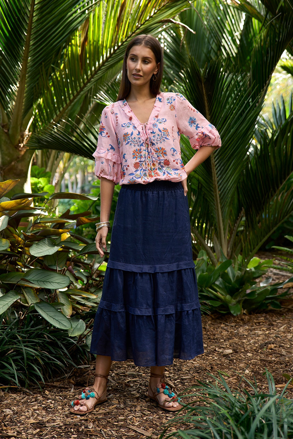 Blush multi ramie blouse with a deep V-neckline, tie detail, short blouson sleeves with elasticated cuffs and side splits