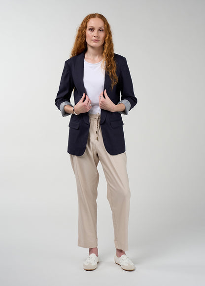 Tailored shawl collar jacket in navy with a rolled collar and structured silhouette