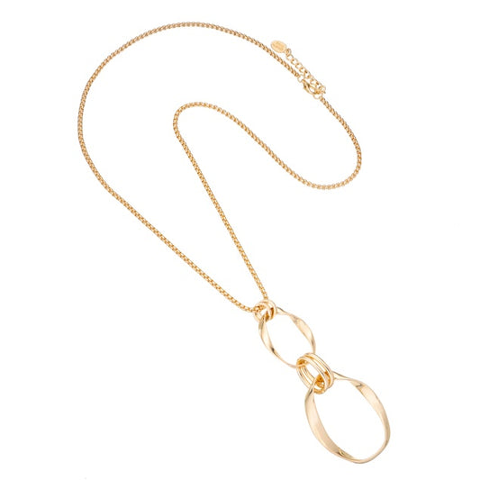 Oval-shaped gold necklace with two intricately designed pendants, shown against a plain background