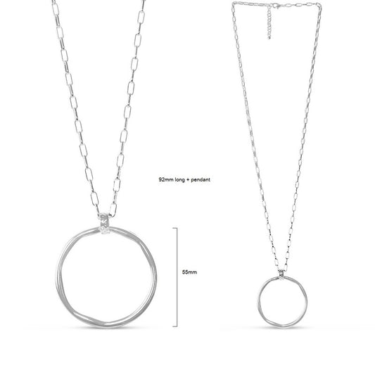 Silver metal circle pendant necklace on a long, sleek silver metal chain