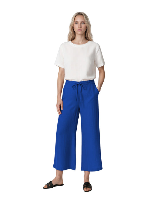 Wide-leg drawstring linen pants in a relaxed fit with an elasticated-look gathered waist, shown in a solid colour