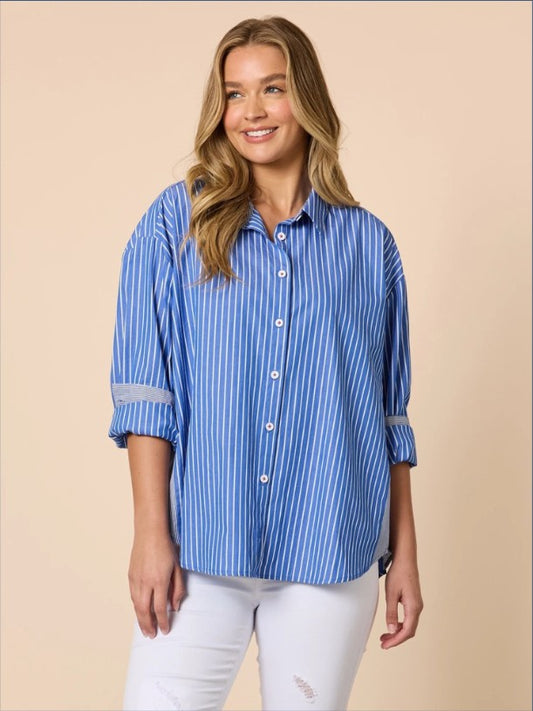Oversized blue and white fine stripe cotton button-up shirt with contrasting side panels, cuffs and a curved hem