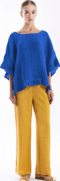 Loose-fitting linen gauze blouse with delicate ruffles, shown in a light airy weave, available in white, tulip, saphire and emerald