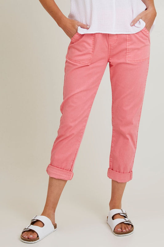 Coral pink cotton capri pants with an elastic waistband, relaxed tapered legs and rolled-back cuffs