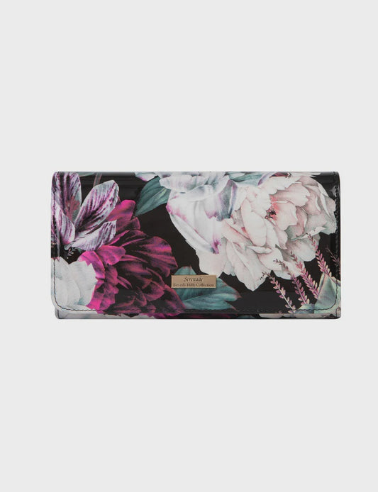 Large patent leather wallet by Serenade Leather with light gold metal fittings and a zip closure