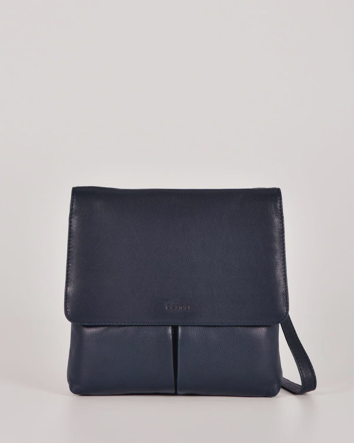 Gabee Ava crossbody bag in soft natural leather with a flap-over magnetic closure, front pockets and an adjustable leather strap