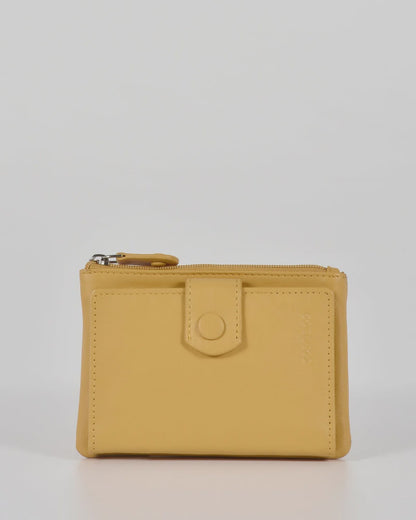 Gabee Collins compact leather wallet, wider than it is tall, with a zip pocket and a key chain attached