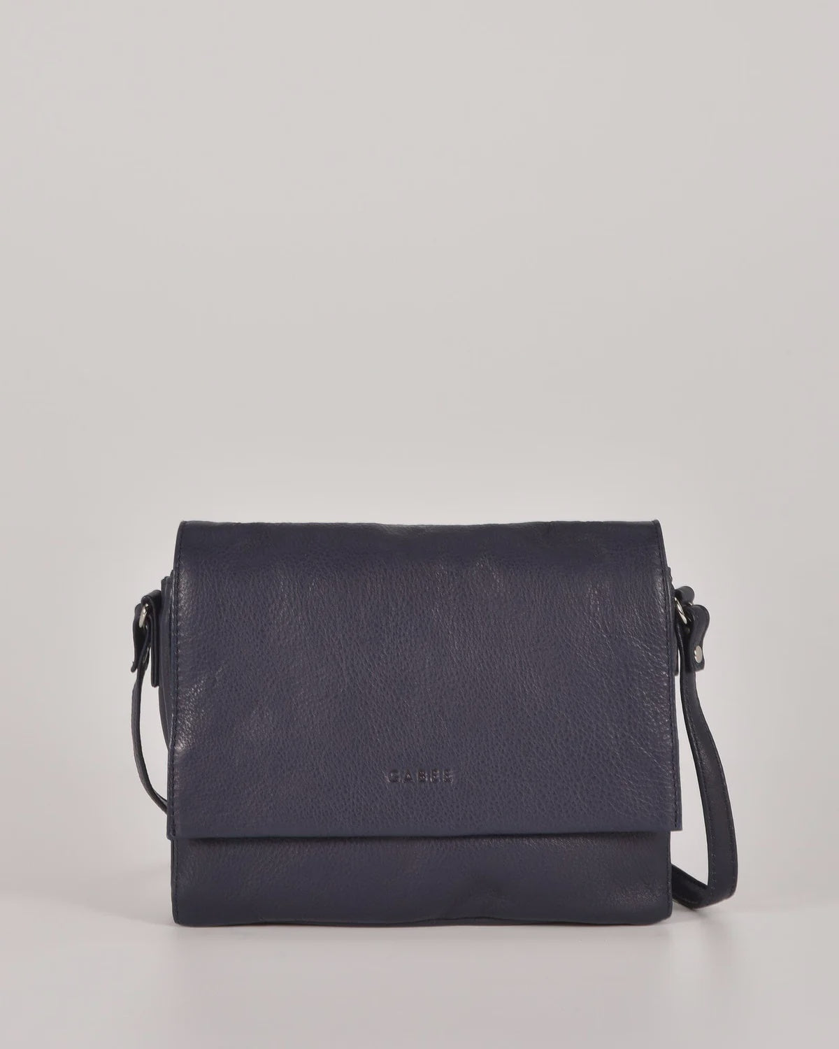 Gabee Eloise leather shoulder bag with snap closure, silver hardware and a fine adjustable strap, shown in navy