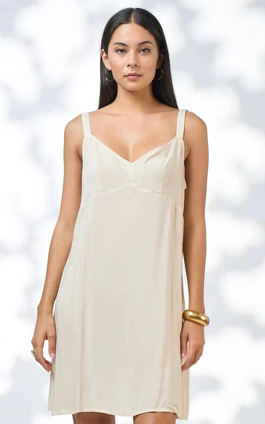 Nude slip dress with wide adjustable straps, side splits and bust darts, in soft rayon