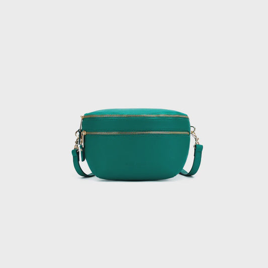 Wide zip-top PU handbag in green, sand or pink with gold hardware, front zip pockets and two adjustable straps, one PU and one cotton