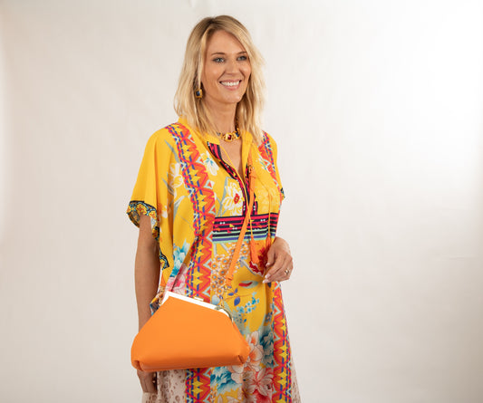 Sassy Duck Charlotte crossbody bag in vegan leather with gold hardware, asymmetric slanted shape and long strap