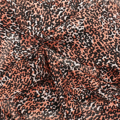 Oblong pure silk scarf with a leopard print in rust and black, shown beside a teal and black colourway, with stitched edges