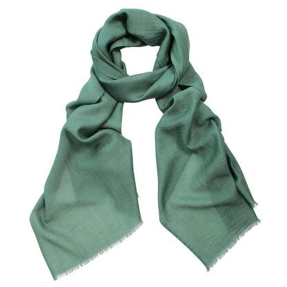 Oblong wool and silk twill scarf with delicate self-fringed ends, shown in a soft mélange colour
