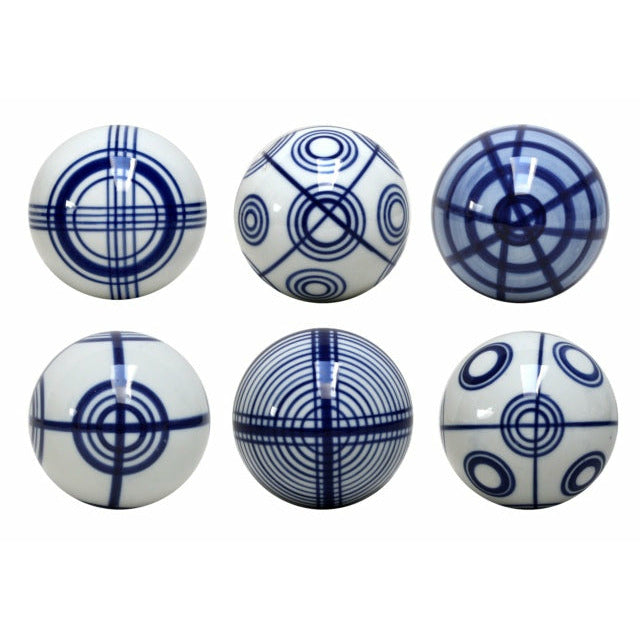 Blue and white geometric decorative balls in six different patterns from Jonglea