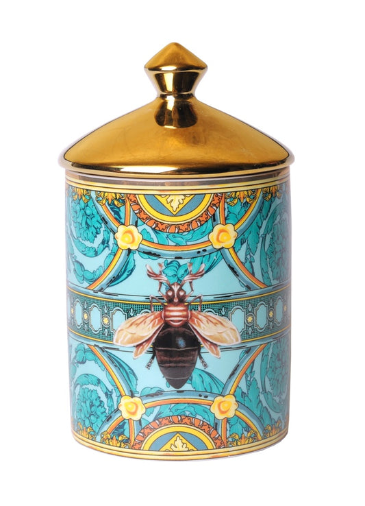 Teal glass jar candle with a bee design, 14cm tall, with a lid and wick visible