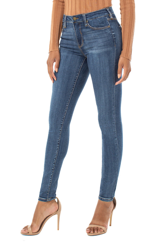 Liverpool Abby skinny jeans in Victory, a deep denim shade, with five pockets, belt loops, zip fly and single logo button