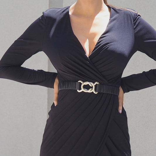 Rouched black stretch leather belt with a shiny gold clasp, 2.5cm wide, shown coiled to display the gathered texture