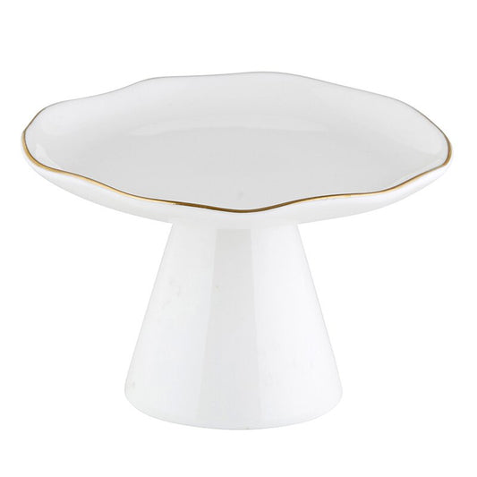 Small ceramic pedestal tray with a gold rim and a minimalist modern design, standing on a short base