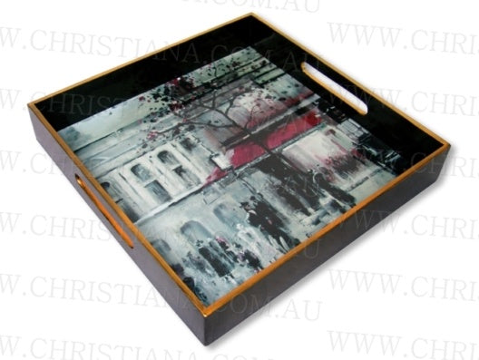 Black wooden tray with cut-out handles, a printed Paris street painting and a gold rim