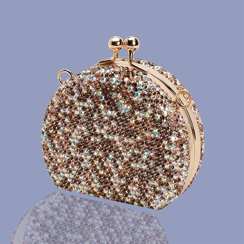 Small sparkling hard case evening bag in aqua, silver and gold with a glittering finish