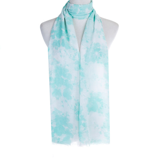 Turquoise cotton and viscose scarf with a subtle sheen, shown draped in soft folds