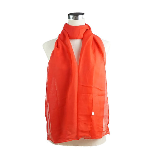Plain cotton and viscose scarf in blue, dark green, red and light teal, shown with a soft, draped finish
